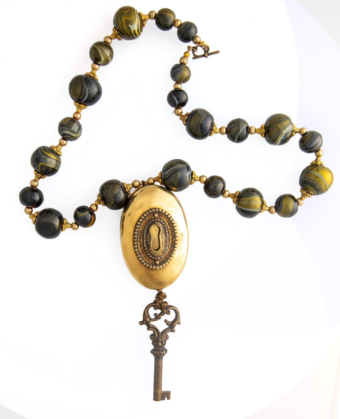 Brass Lid and Esctucheon Necklace