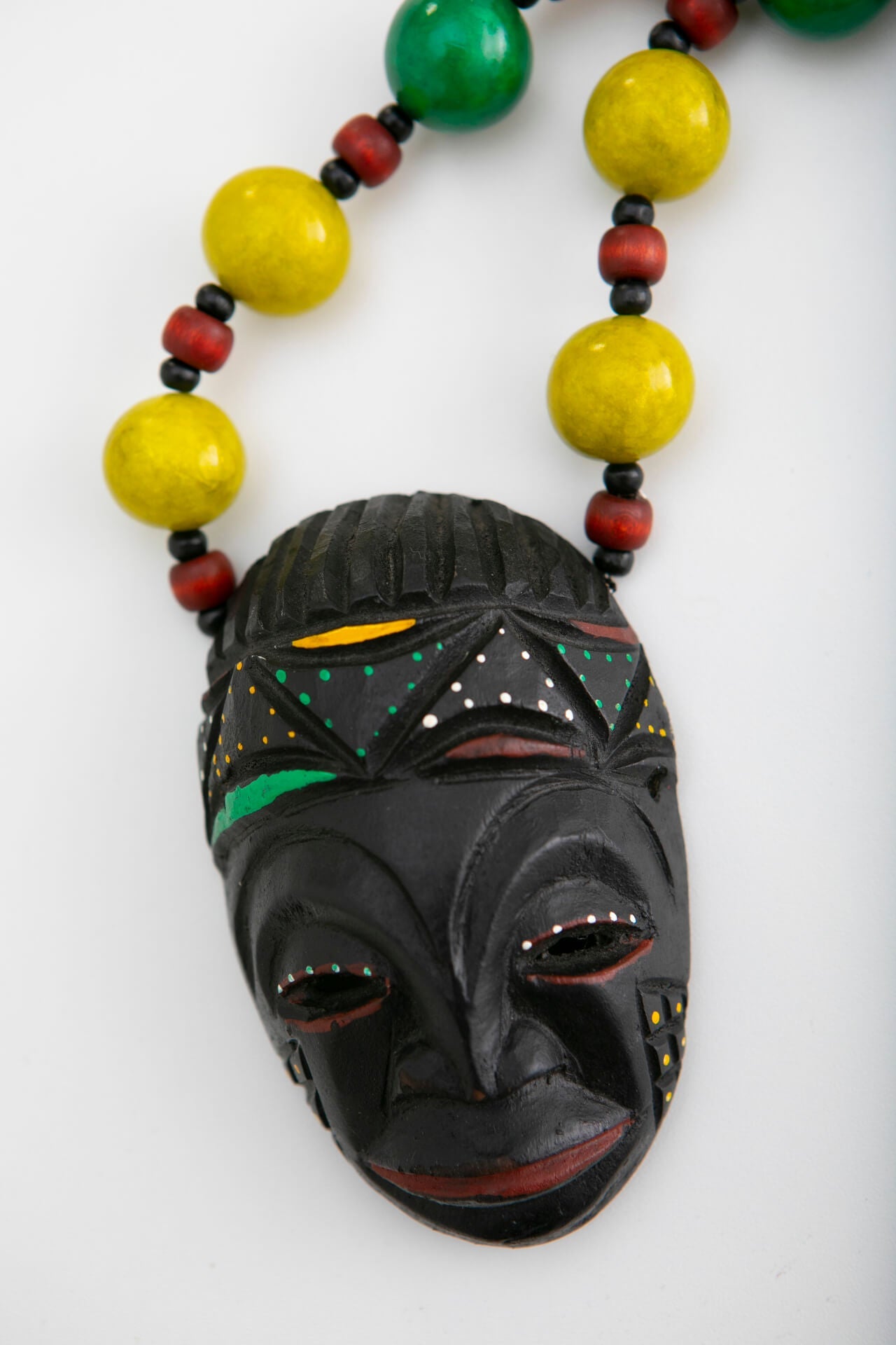 Long Wood Mask Necklace with Yellow, Green and Orange Beads | Hopetown & Hunter