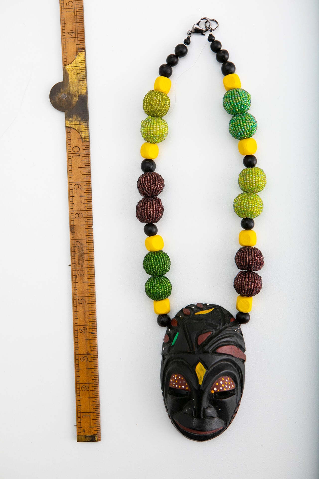 Short Wood Mask Necklace with Yellow, Green and Brown Beads | Hopetown & Hunter