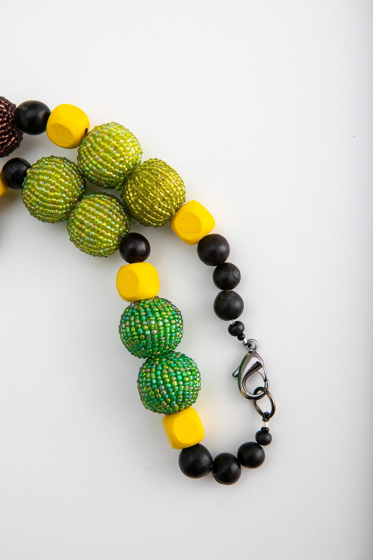 Short Wood Mask Necklace with Yellow, Green and Brown Beads | Hopetown & Hunter